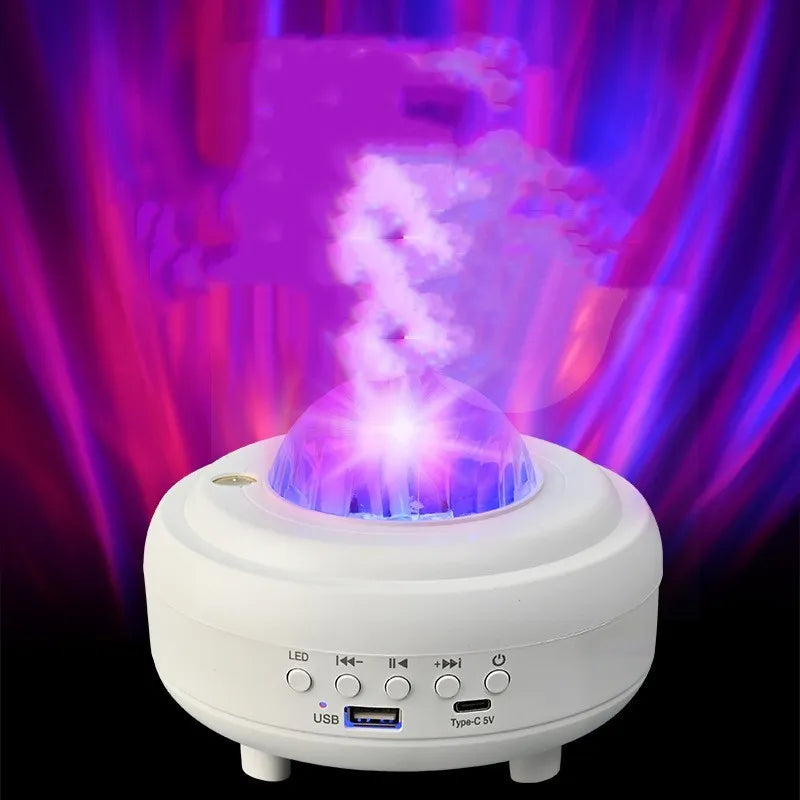 White and black rechargeable galaxy star projector night light with Bluetooth speaker on a table.