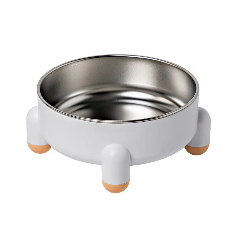 Green stainless steel pet bowl with non-slip base and high foot design on a wooden floor