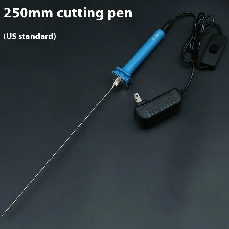 Blue plastic-handled electric foam cutter pen with adapter on a work surface.