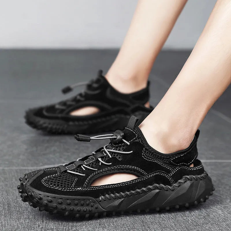 Men's black hollow sports sandals with leather mesh upper, rubber sole, and elastic band closure