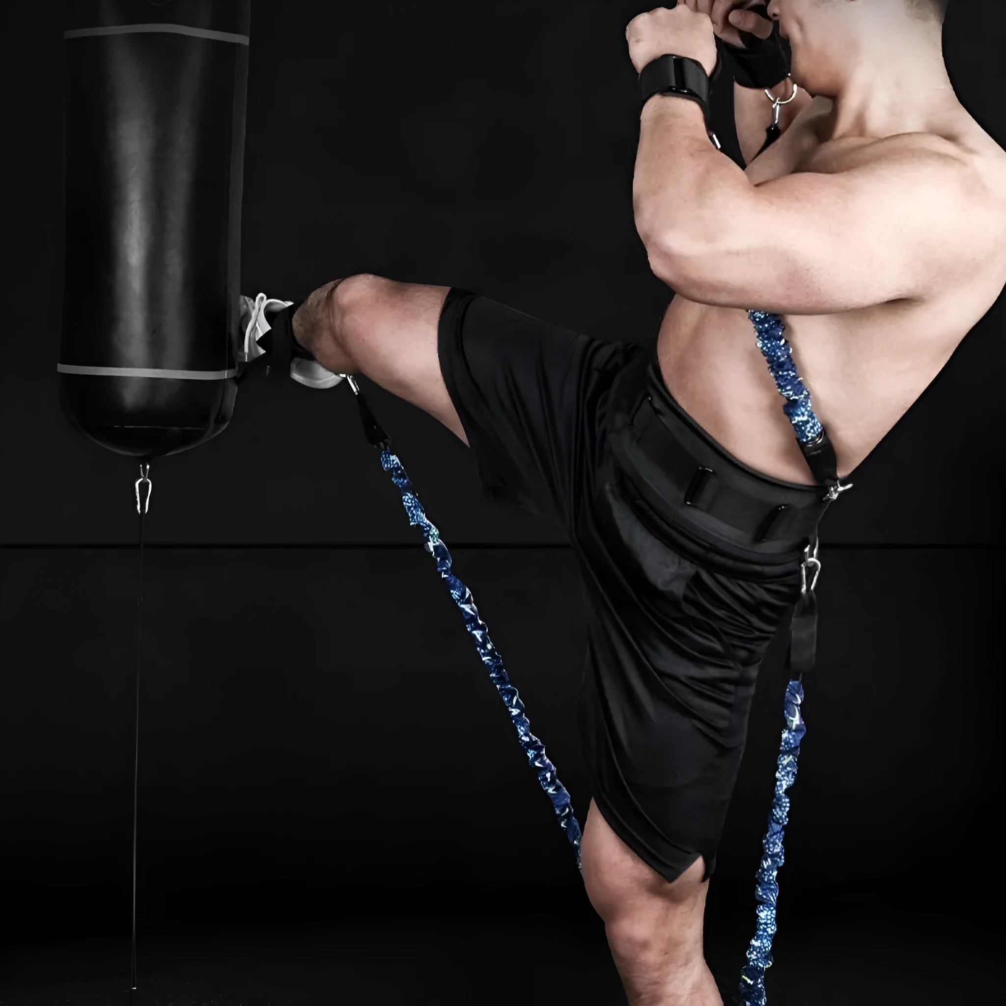 Fitness chest expander resistance belt with red, blue, black, and green sleeves indicating 100 to 300 lbs resistance.