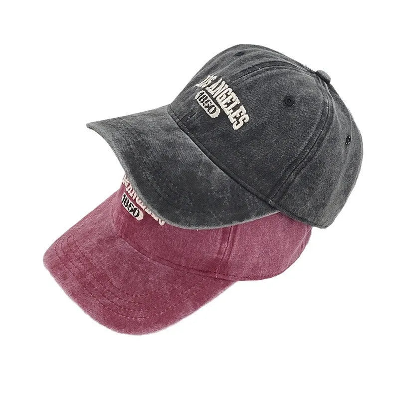 Personalised embroidered retro-style peaked cap in distressed beige with adjustable strap