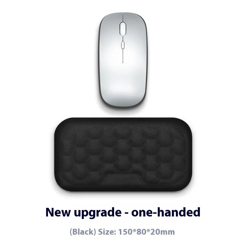 Memory foam mouse wrist rest pad with silicone base in black cloth cover option on desk