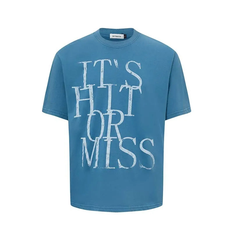 Man wearing a blue American retro style t-shirt with white letter printing, loose fit round neck.