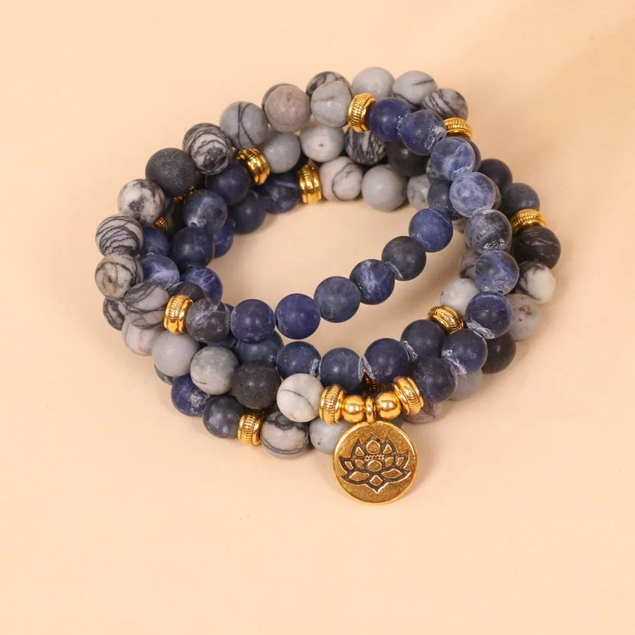 Blue patterned network stone bead multi layer bracelet with alloy charms and adjustable clasp