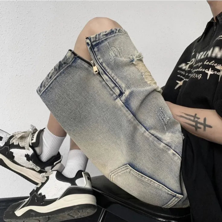 Blue retro tattered denim shorts with a wide leg loose fit on a mannequin