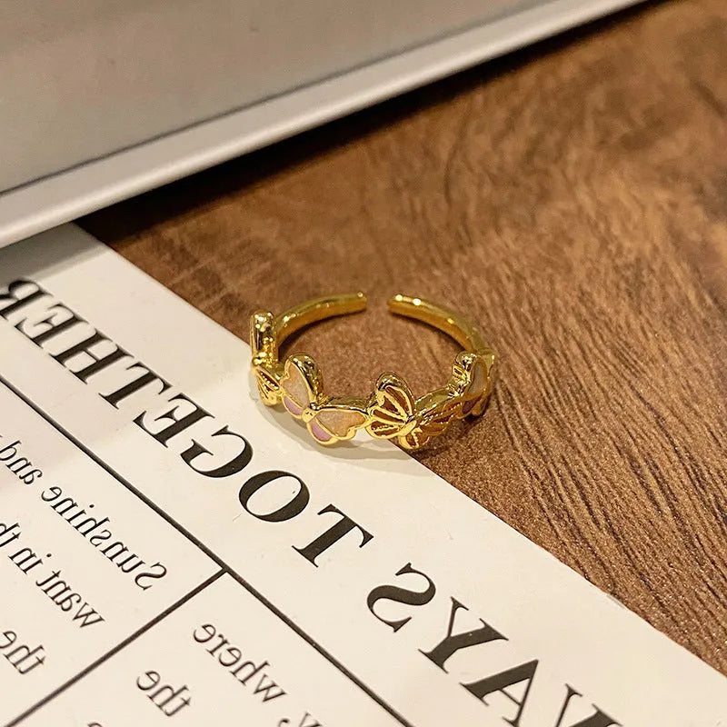 Copper Chinese butterfly women's ring showing creative design with oil dripping treatment finish