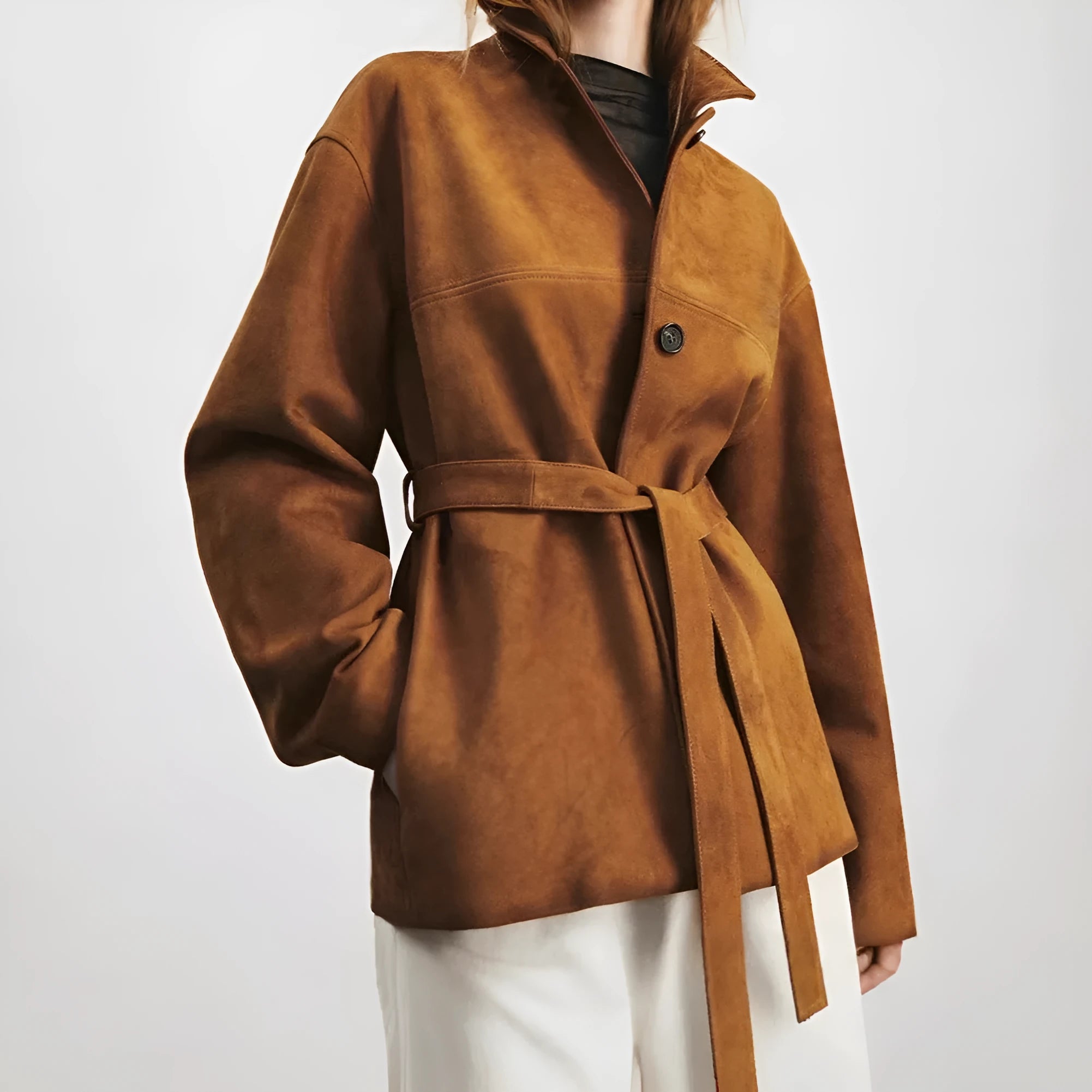 Mid-length cashmere coat with peter pan collar and leather stitching details in yellow brown colour
