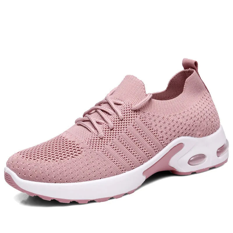 Women's black mesh casual sneakers with round toe, lace-up front, and a soft PVC sole.