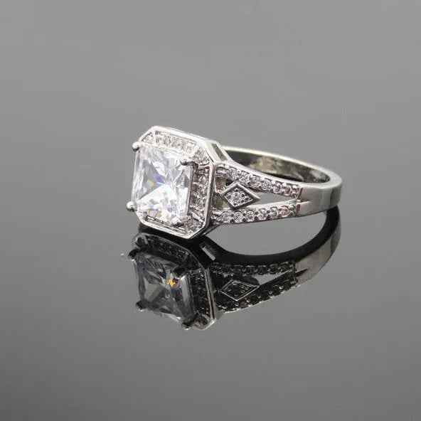 Geometric hollowed zircon ring in platinum colour on copper with quadrilateral design