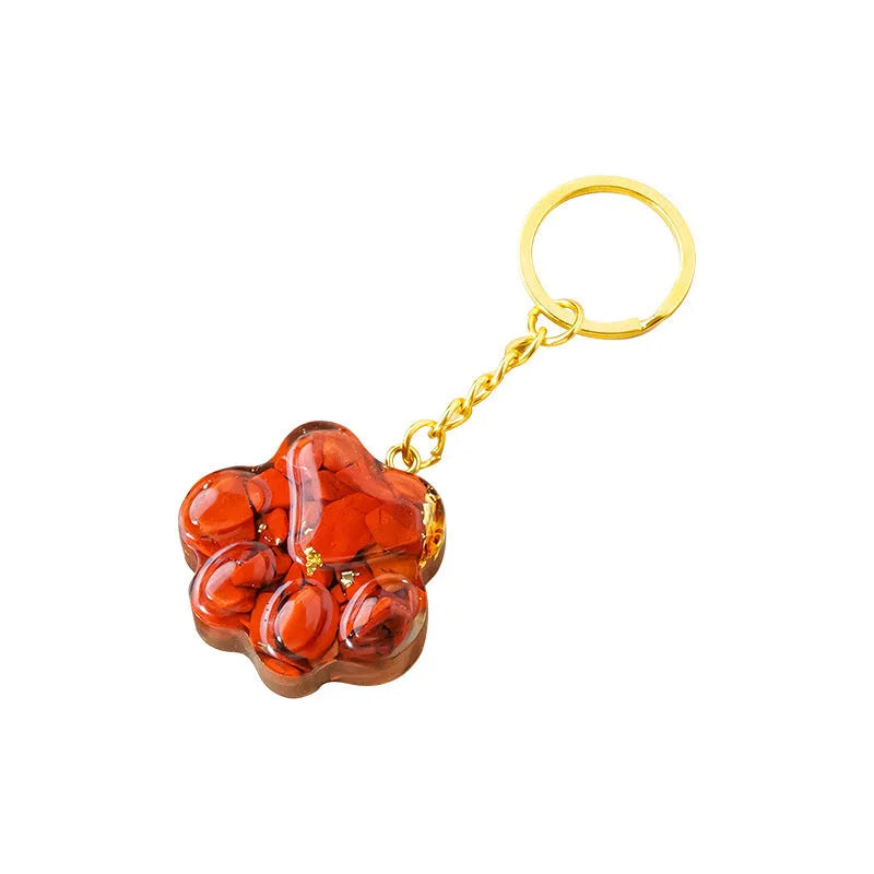 Natural crystal cat's paw keychain pendant charm in one of ten crystal types including pink crystal and amethyst.
