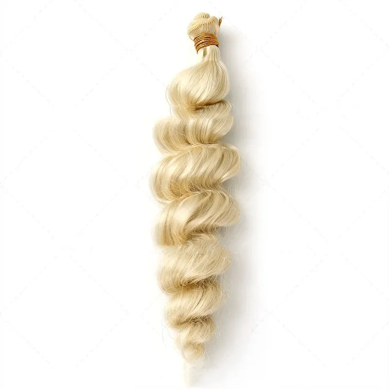 Golden synthetic hair weft wig showing length options on a stand.