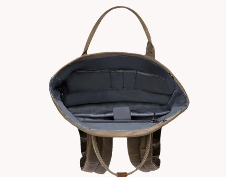 Casual black polyester backpack showing interior computer pocket and under 20-litre capacity