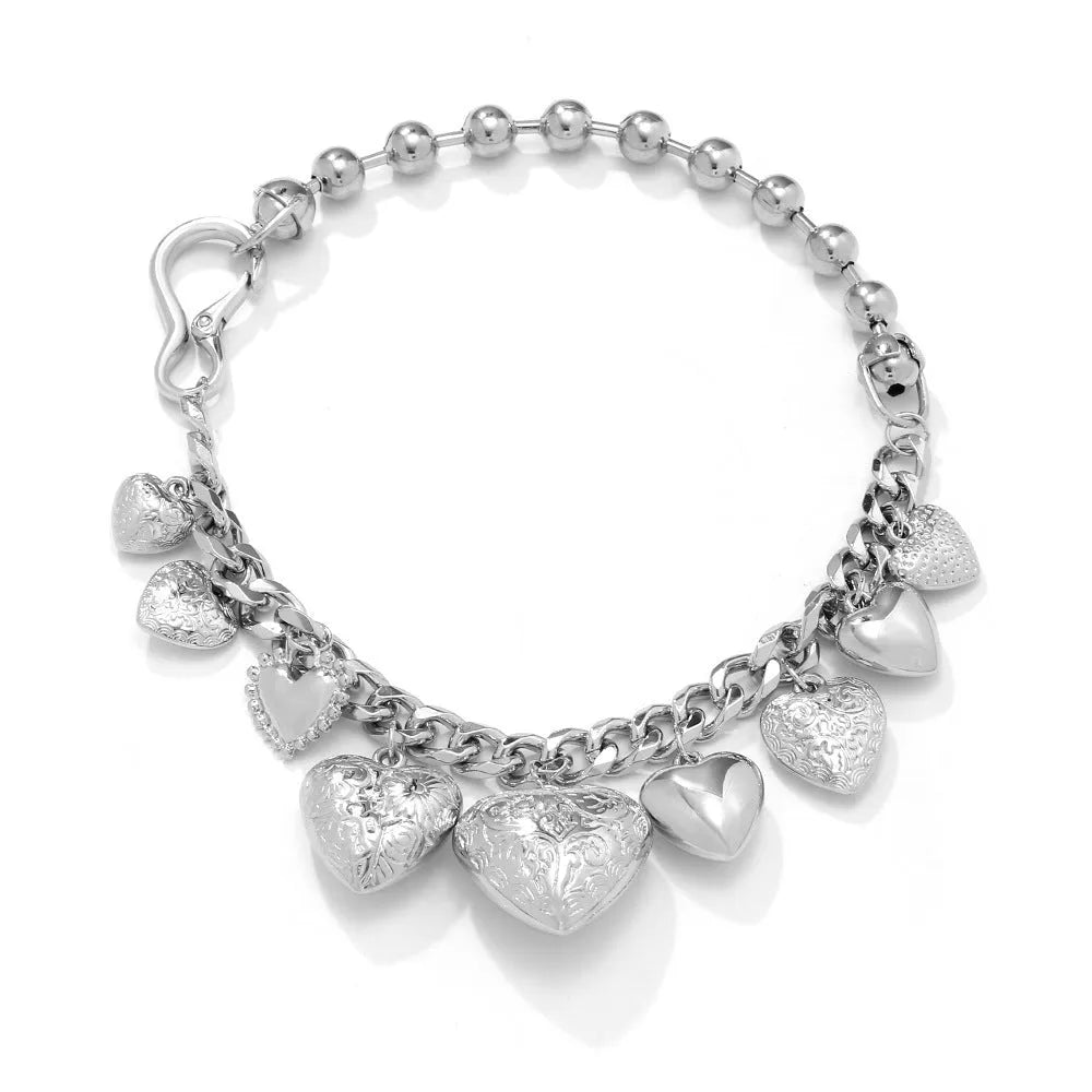 Women's gold carved heart pendant necklace on metal chain with adjustable 41-50cm length