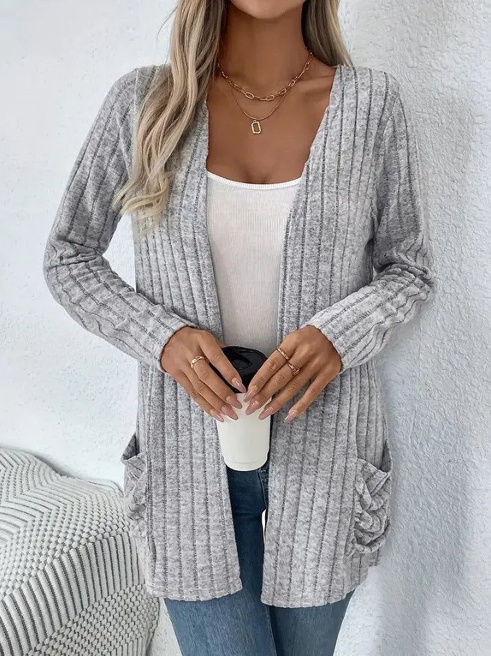 Long sleeve loose fit cardigan in solid colour with pockets, shown in black and granny grey.