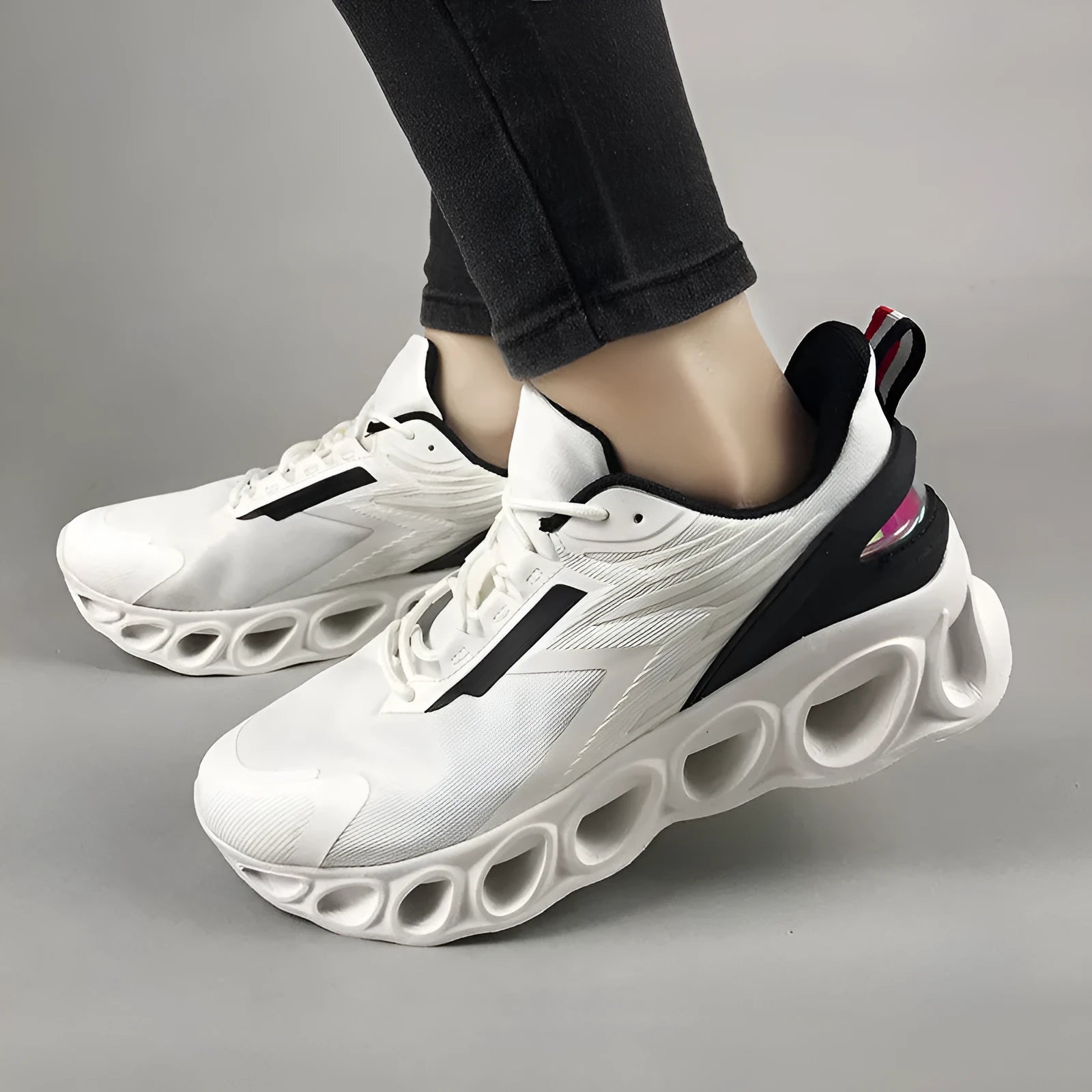 Men's casual lace-up sports shoes in black with breathable mesh upper and round toe.