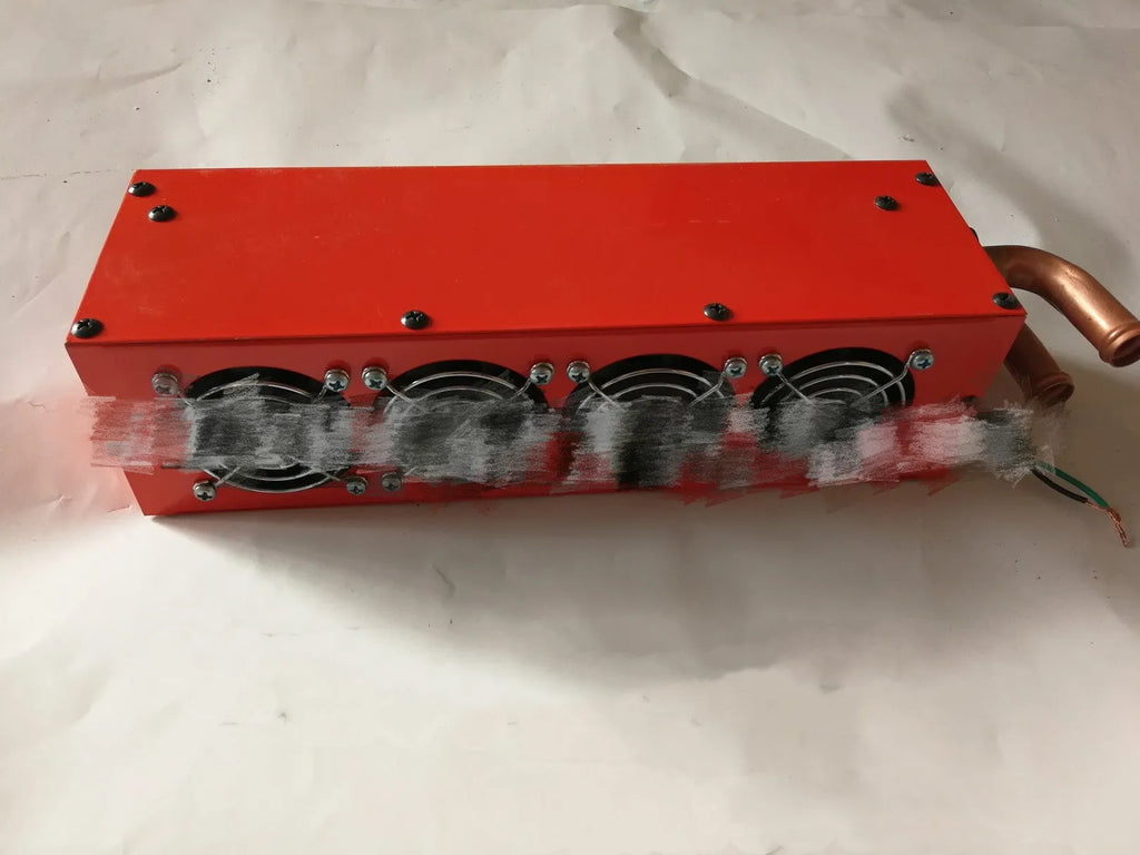 Metal car heating unit with copper piping for 12V/24V vehicle installation measuring 34x12x8cm