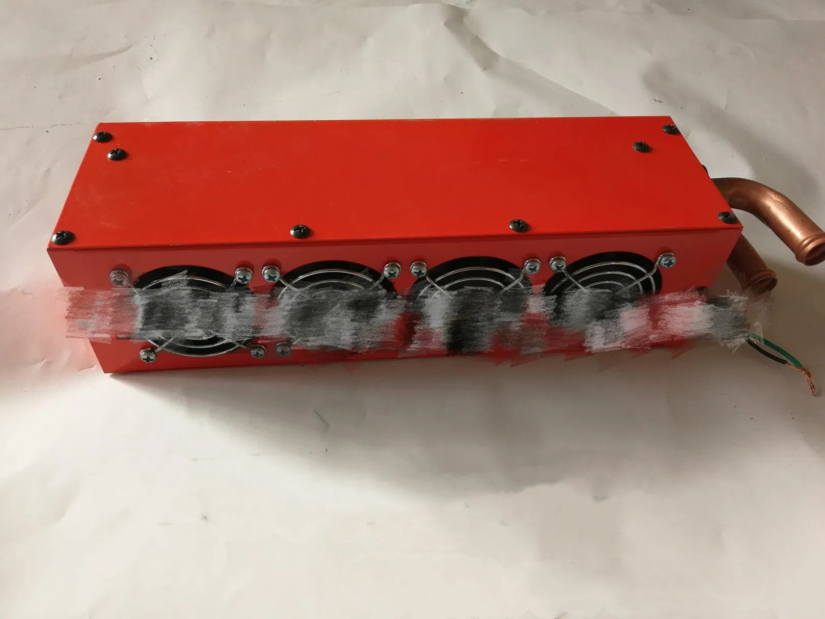 Metal car heating unit with copper piping for 12V/24V vehicle installation measuring 34x12x8cm