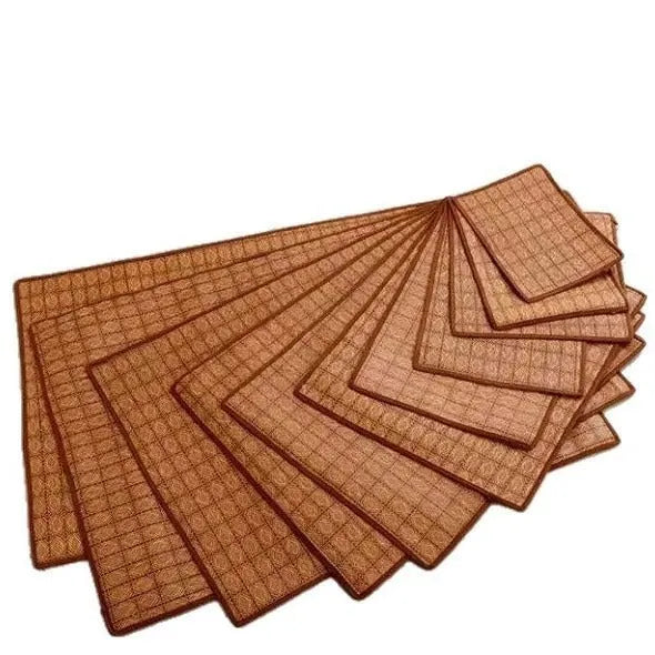 Brown woven rattan fibre cooling mat for dogs on a wooden floor