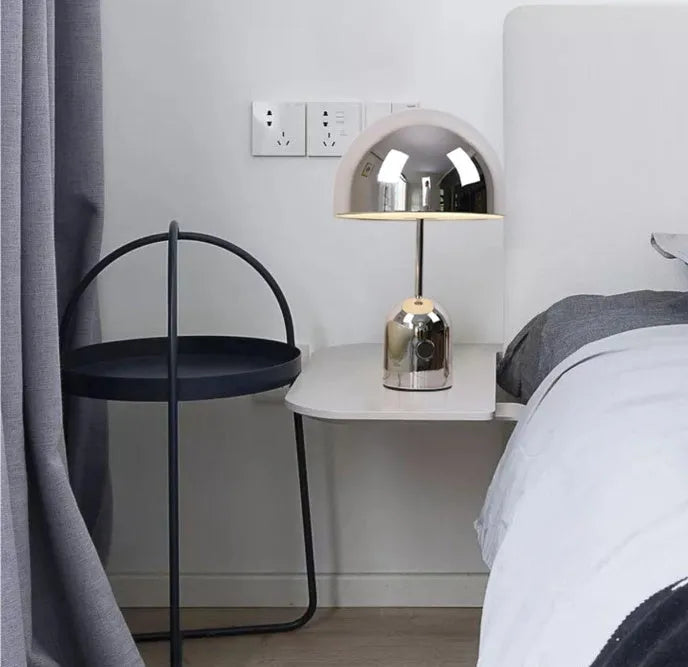Post-modern metal base table lamp in rose gold finish measuring 280mm by 450mm