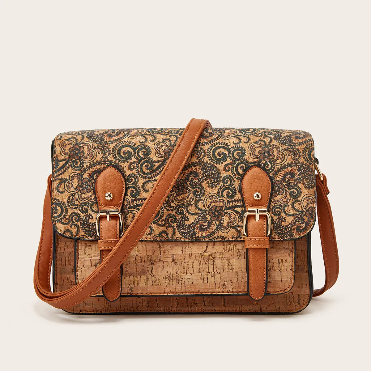 Women's large crossbody bag in a printed PU material with a single shoulder strap.