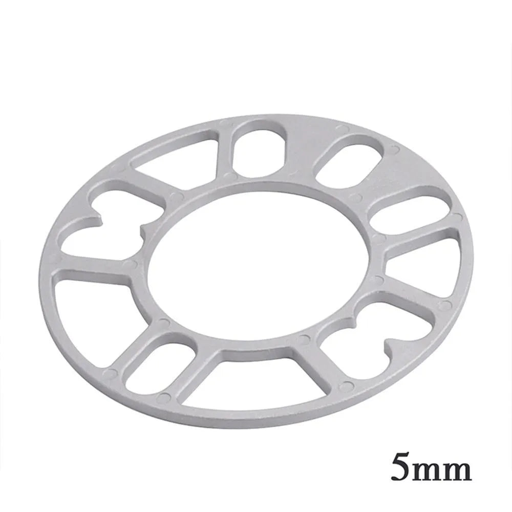 Automotive wheel hub widening gasket or spacer in 3mm, 5mm, 8mm, and 10mm thickness options.
