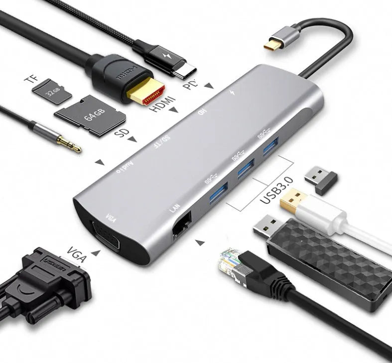 Grey aluminium USB-C docking station with HDMI, VGA, USB ports and a short connecting cable