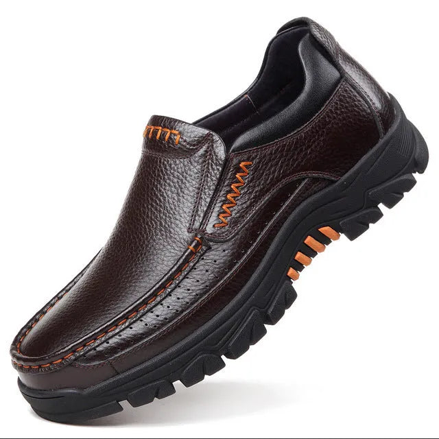 Men's black and brown leather slip-on business casual shoes with a rubber sole.