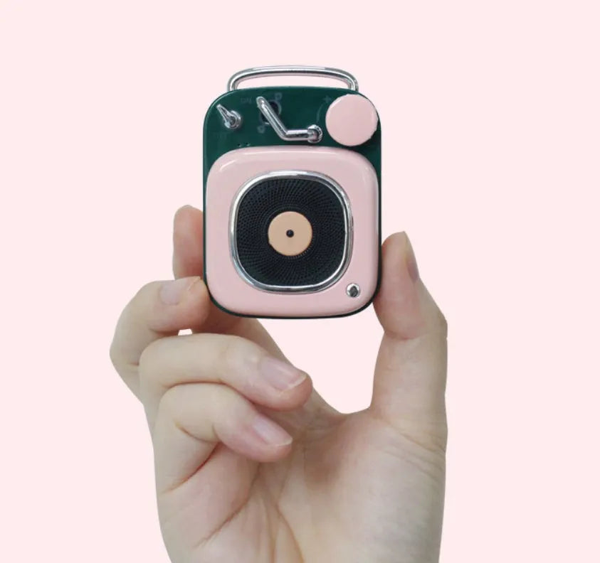 Portable mini speaker in blue, compact size 4.8x6.2x2.8cm with metal body