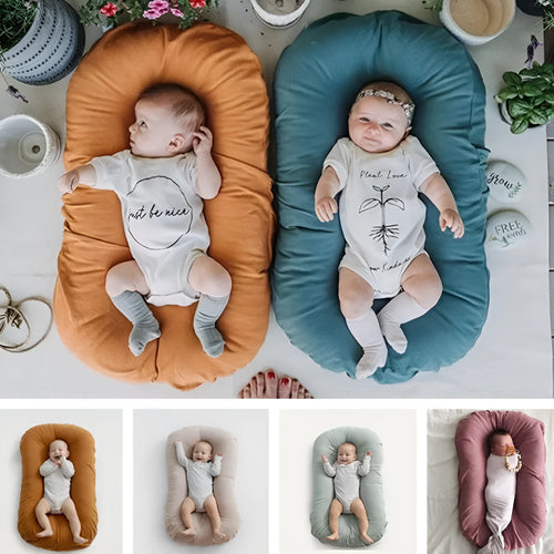 Portable baby nest crib measuring 75x45cm in cotton with PP cotton filler