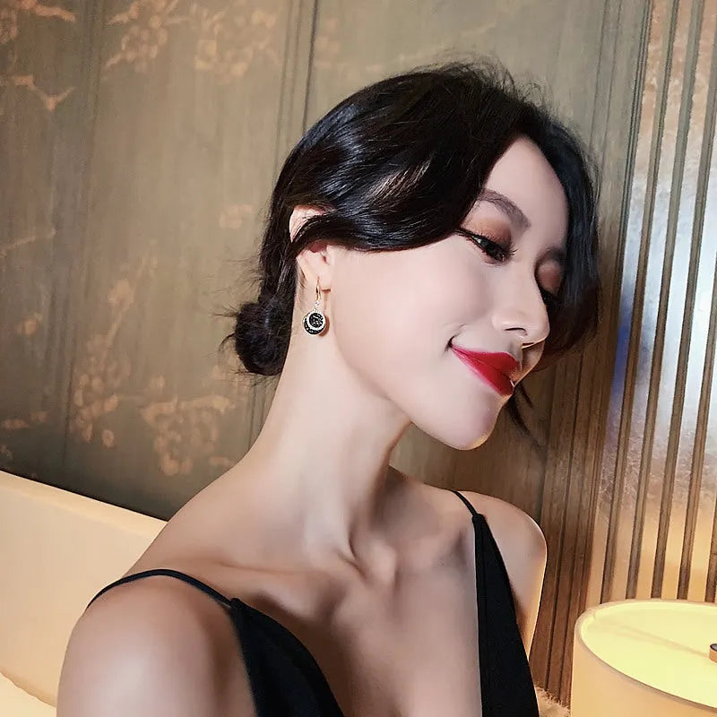 Black retro Hong Kong style geometric alloy earrings measuring 3.6cm length