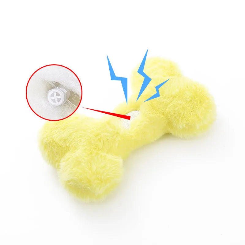 Blue plush bone-shaped dog toy with a squeaker for interactive bite-resistant play