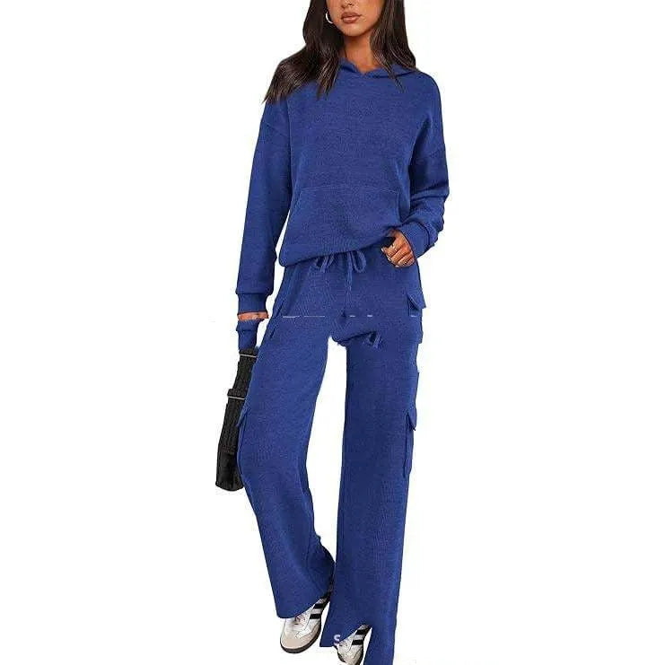 Women's polyester leisure sports suit set showing long sleeve top and matching trousers in multiple colour options
