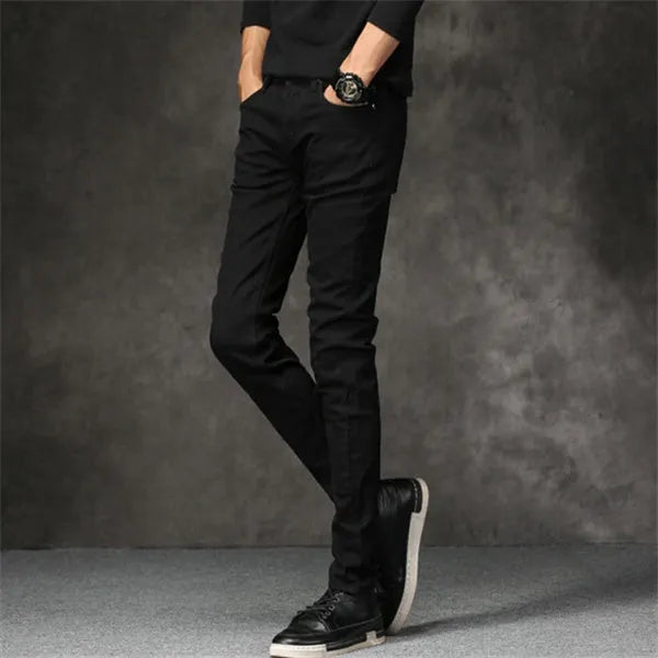 Slim-fit stretch cotton men's pants in black, laid flat showing tight cut and full length