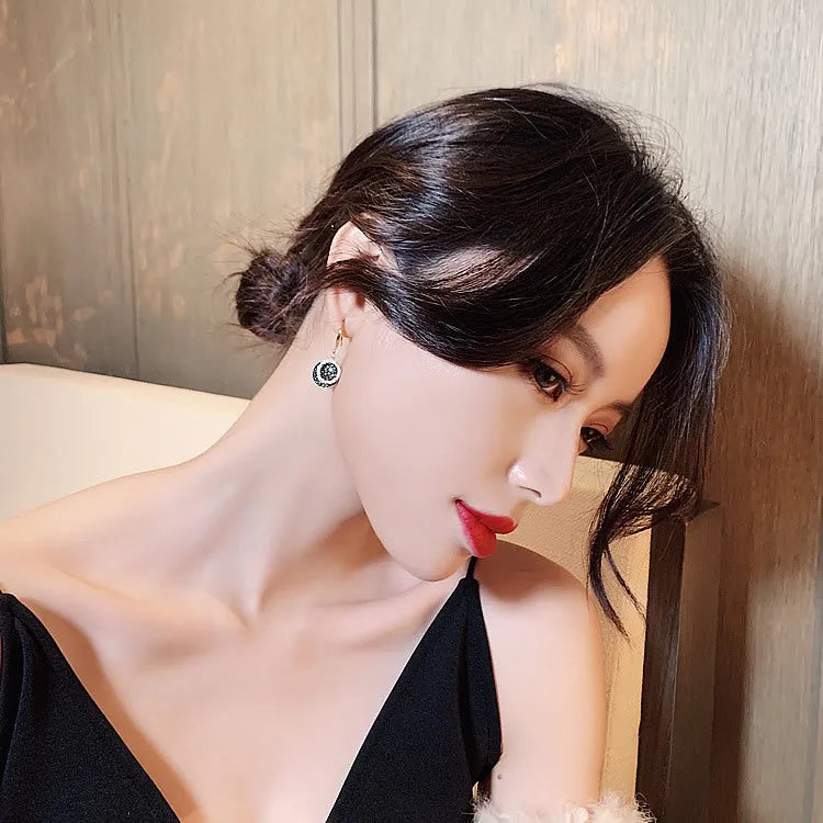 Black retro Hong Kong style geometric alloy earrings measuring 3.6cm length
