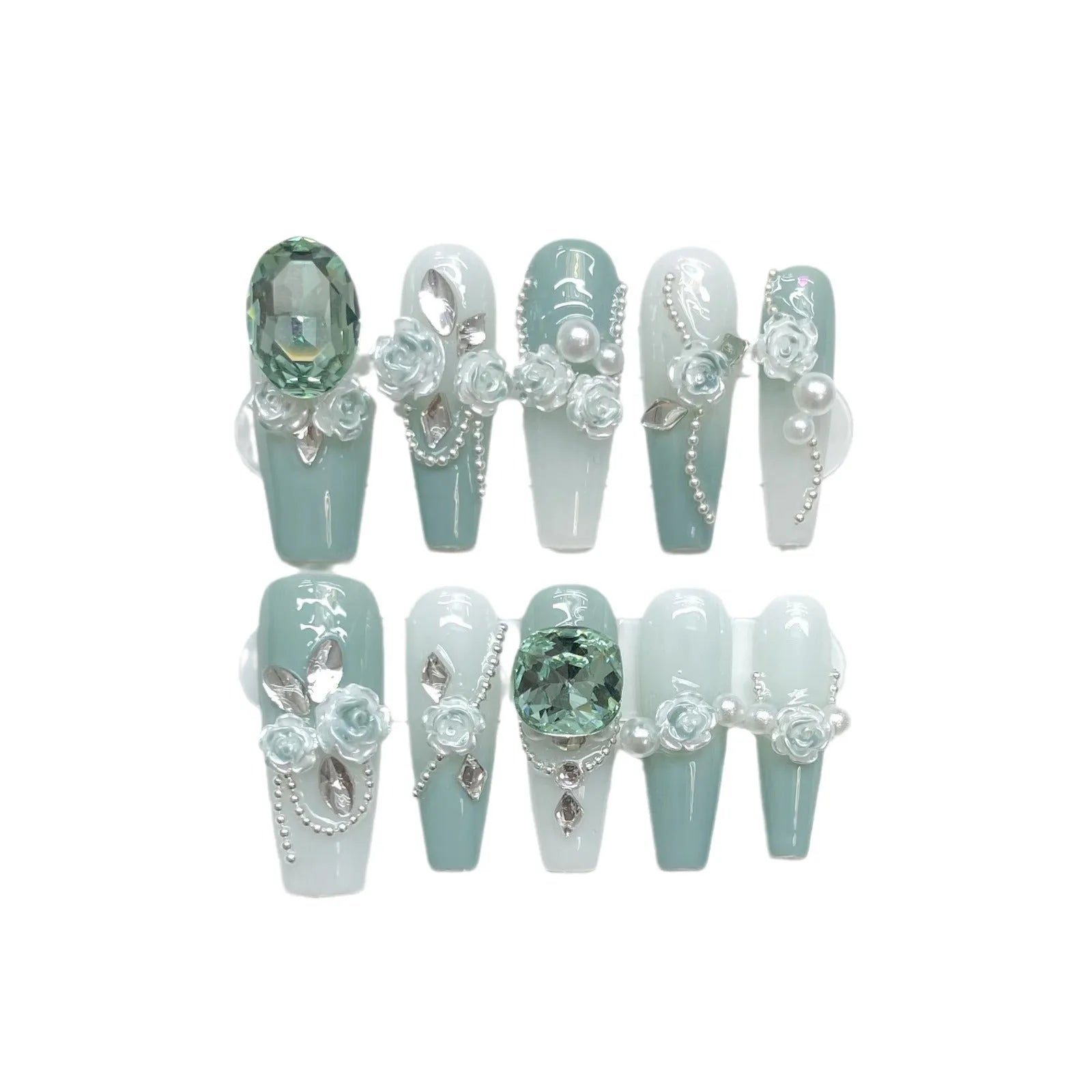 Green plastic nail armour suit with diamond accents and a gradient camellia chain decoration.