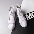 Men's black and white PU leather winter ankle boots in high-top sneaker style showing size range