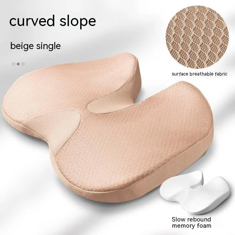 Curved memory foam seat cushion in beige for tailbone and back support