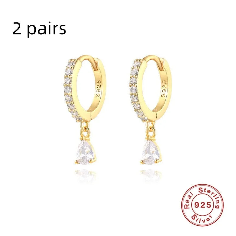 Geometric water drop earrings in Sterling Silver with electroplated gold finish and purple diamond stones