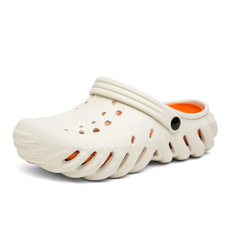 Men's beige EVA slipper sandals with hollow-out design and round toe holder on a plain background.