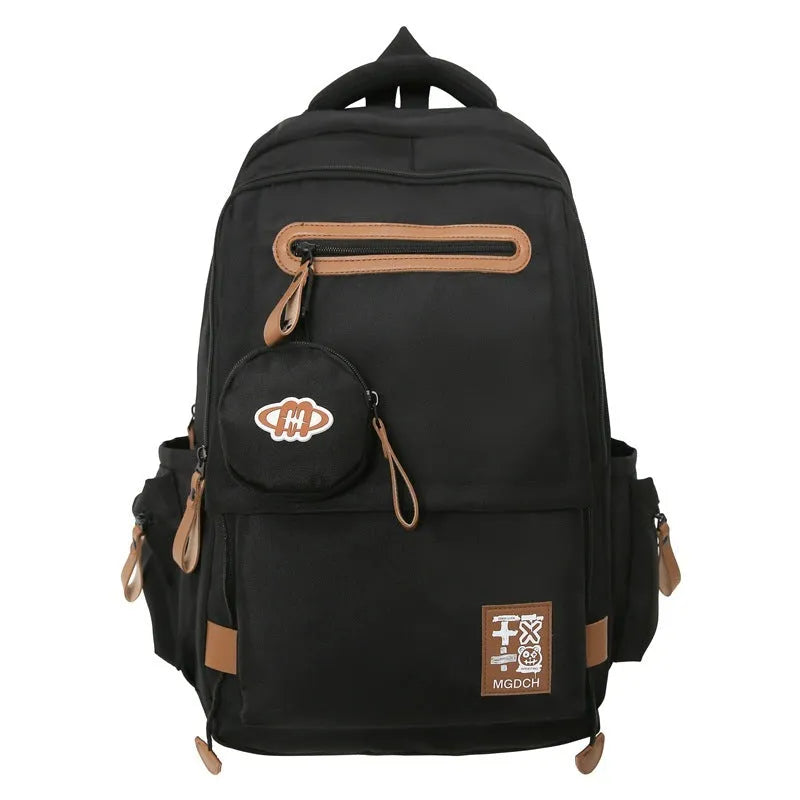 Large nylon backpack for middle school students with curved shoulder straps in solid colour options