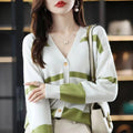 Women's striped V-neck knitted cardigan with 3D pattern in a slim fit, shown in multiple colour options.