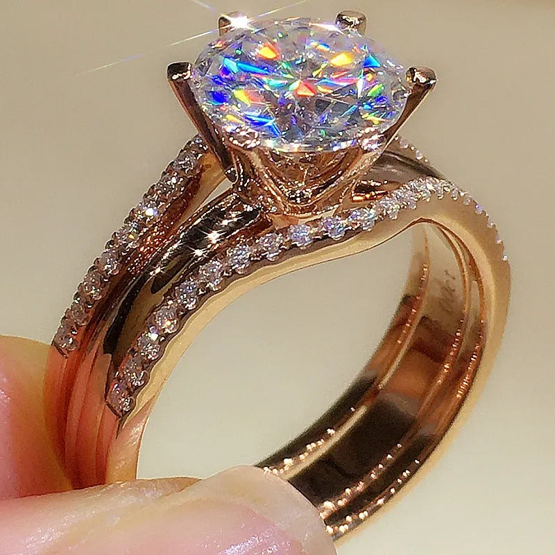 18K gold Mosonite matching ring with D colour stone in rose gold finish on white background