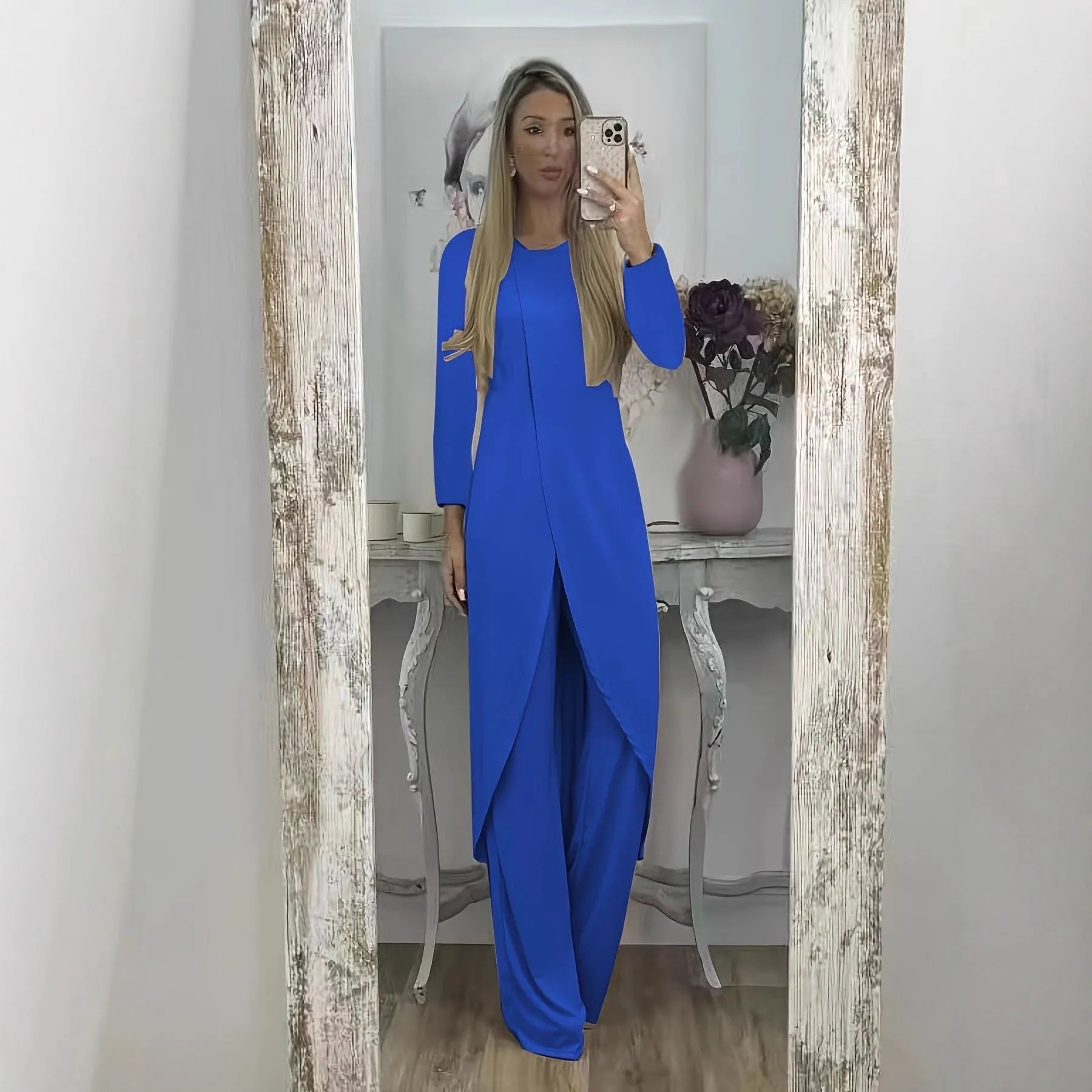 A loose-fitting long sleeve two-piece lounge set in polyester, shown in khaki colour, consisting of a round-neck top and matching trousers.