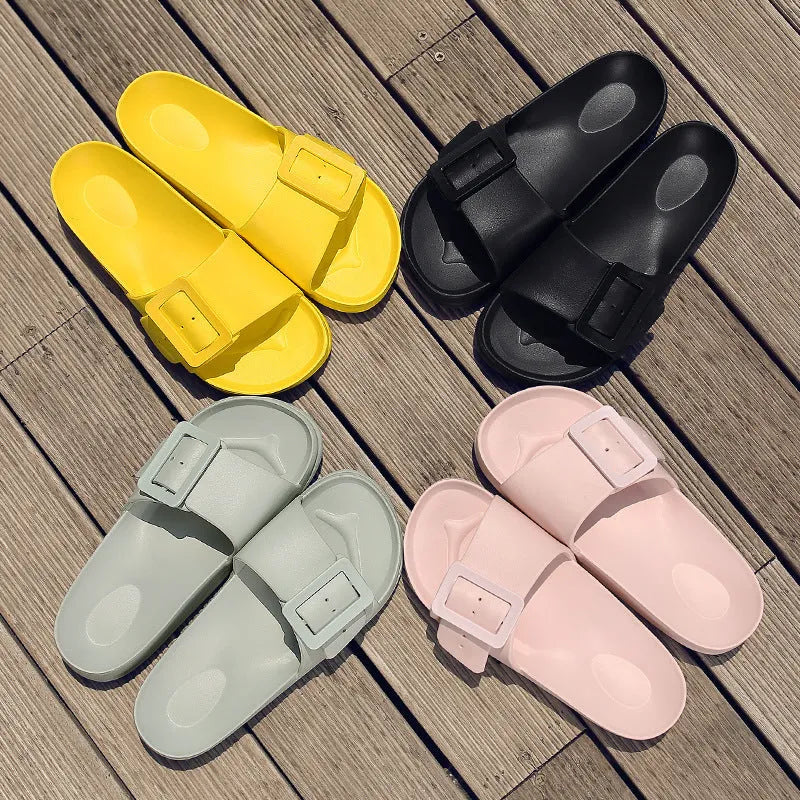 Women's grey blue buckle fastening flip-flop sandals with soft EVA sole on a white background.