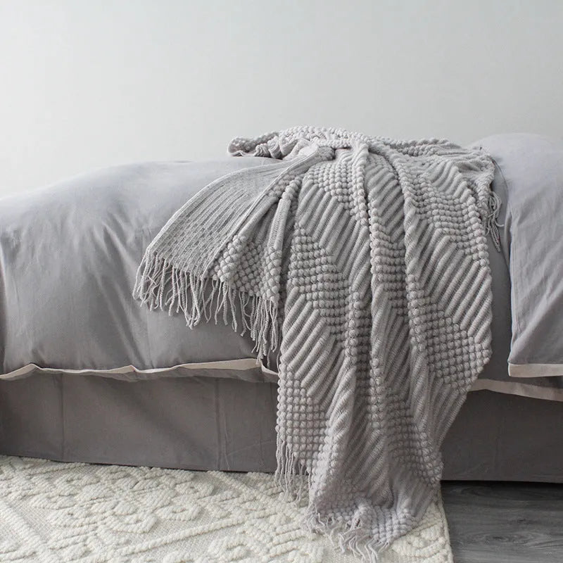Small polyester nap blanket in dark grey, khaki, or light grey, dimensions 127cm by 170cm
