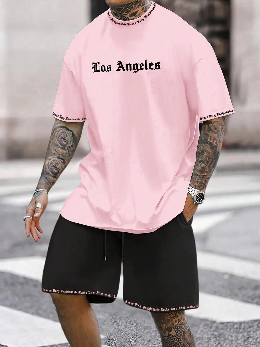 Sports style short-sleeved shorts set with printed pattern, loose fit shorts, and quick-dry fabric