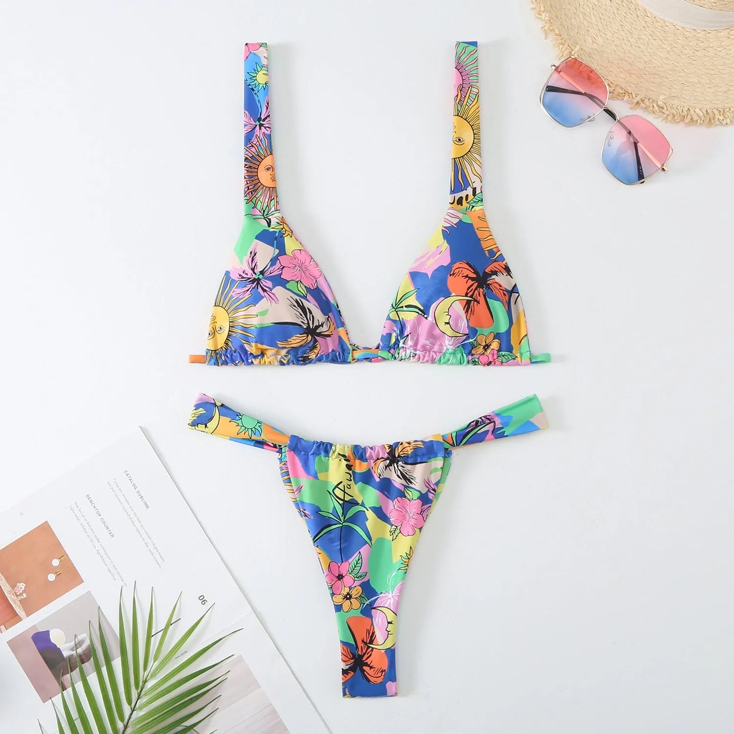 Women's floral print bikini swimsuit in rose red, blue, sky blue or white colours with S, M, L sizing