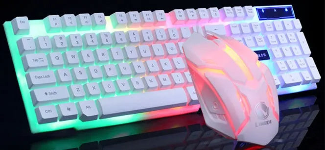GTX300 black and white wired gaming keyboard and mouse set with backlit keys on desk.