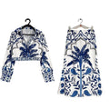 Women's early spring casual two-piece outfit in picture colour, featuring a long-sleeved top and matching long skirt.